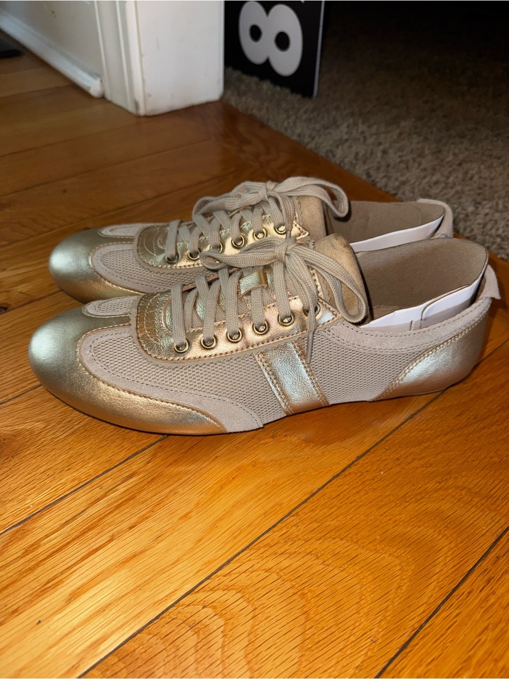 Dansko Women’s Metallic Gold Lace-Up Sneaker